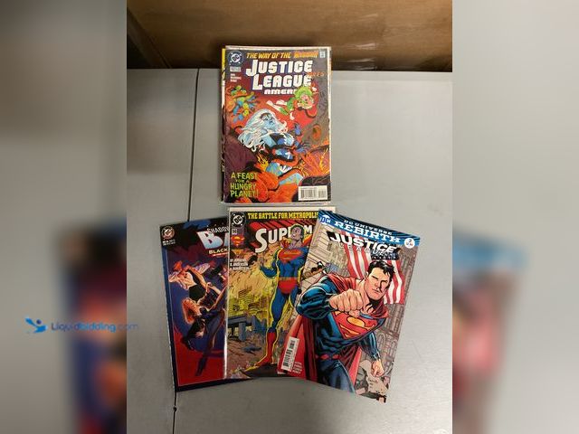 Lot 49-1830573 - COLLECTIBLE LOT OF 20 COLLECTIBLE COMIC BOOKS FROM DC, MARVEL AND MORE. INCLUDING JUSTICE LEUGUE, SU...
