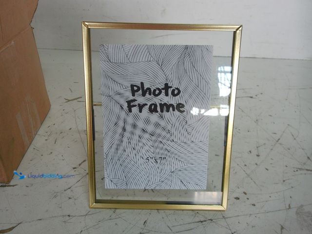 Lot 49-1625202 - Lot of (8) 5"X7" Gold and glass photo frames, Unused.  Ref#CRS0626