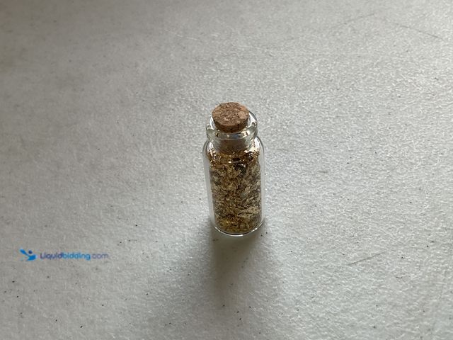 Lot 49-1505064 - RARE ONE INCH GLASS VILE OF PURE 24K GOLD FLAKES