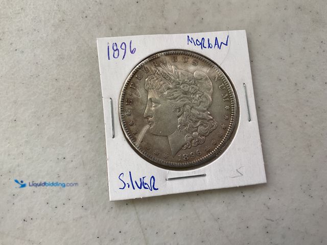 Lot 49-1811269 - 1896 MORGAN SILVER DOLLAR COIN 90% SILVER