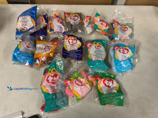 Lot 49-1505631 - COLLECTIBLE LOT OF 15 VINTAGE MCDONALDS HAPPY MEAL TOYS BEANIE BABIES IN ORIGINAL PLASTIC LOADED WIT...