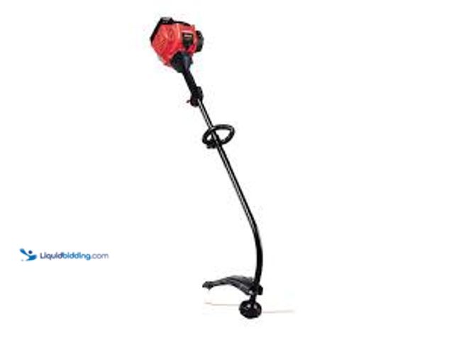 Lot 49-5448387 - Troy-Bilt 16 in. 25cc 2-Cycle Curved Shaft Gas String Trimmer. Model # TB25CB. Unused