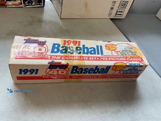 Lot 49-1505227 - COLLECTIBLE FACTORY SEALED 1991 TOPPS BASEBALL COMPLETE 792 CARD SET INCLUDING KEN GRIFFEY JR, BARRY...