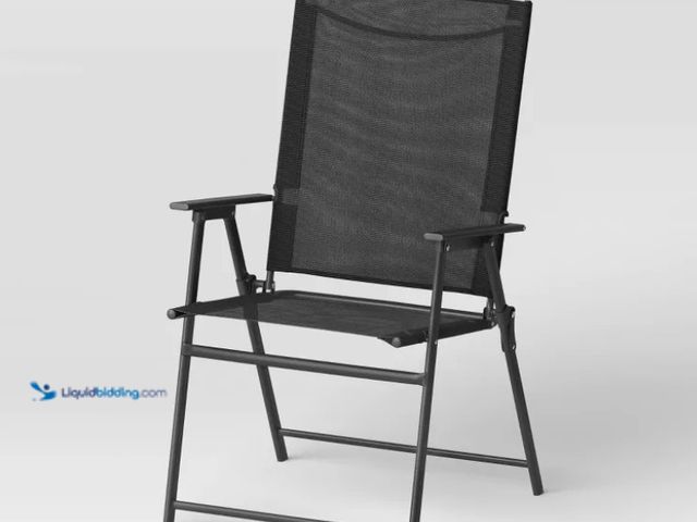 Lot 49-5552906 - Sling Patio Dining Folding Chair Black - Room Essentials™. UPC: 191908909431. Unused