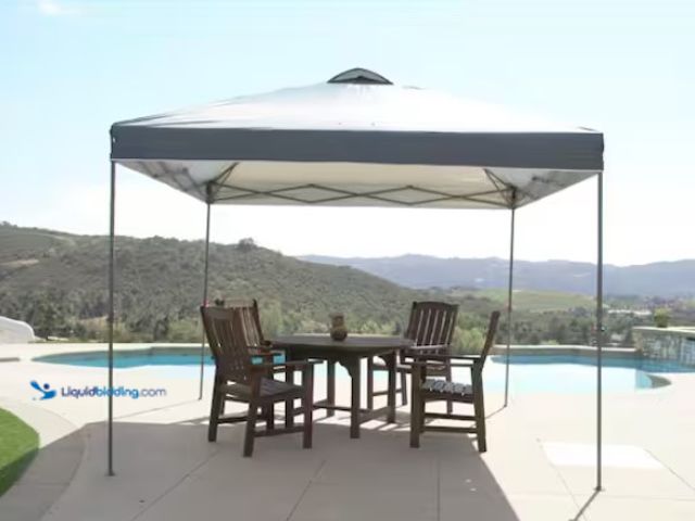 Lot 49-1550298 - Everbilt 10 ft. x 10 ft. Grey Instant Canopy Pop Up Tent, Model # NS CLIA 100-G, Slightly used.  Ref...