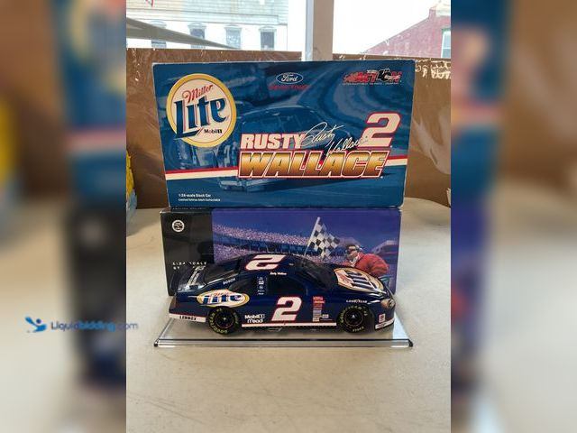 Lot 49-5341591 - ACTION RACING #2 RUSTY WALLACE MILLER LITE 1/24 SCALE DIECAST CAR IN ORIGINAL BOX