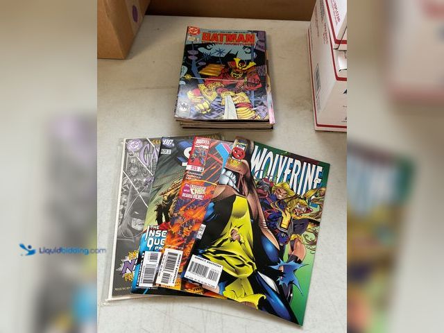 Lot 49-5341518 - LOT OF 20 COLLECTIBLE COMIC BOOKS FROM DC, MARVEL AND MORE INCLUDING WOLVERINE, X-MEN, SPIDER-MAN, C...