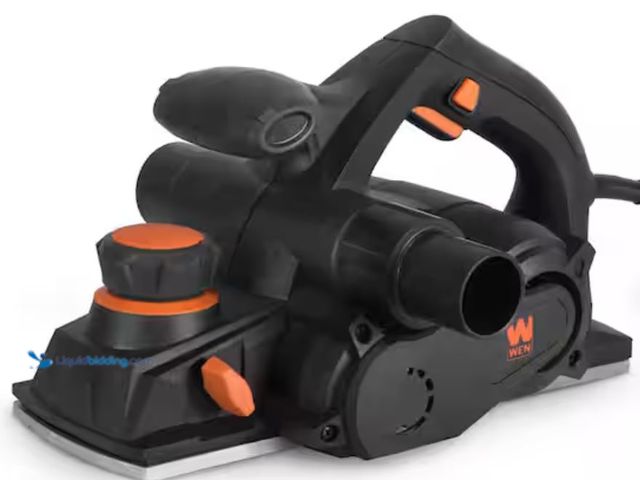 Lot 49-2006085 - WEN 8 Amp 4-3/8 in. Corded Hand Planer, Model # 6534, Used, Has attachments, Powers on, Dirty from u...