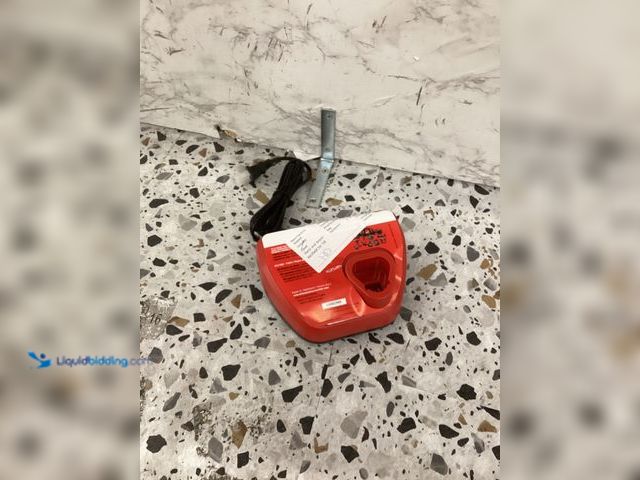 Lot 49-5486153 - Milwaukee M12 Single Bay Charger Item is unused