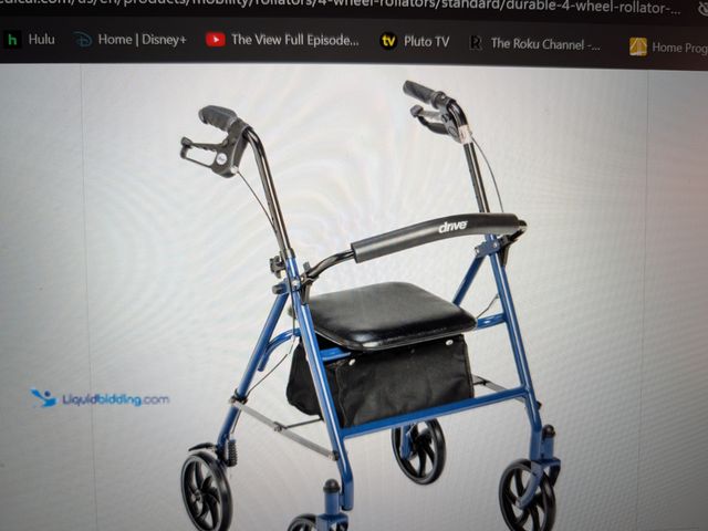 Lot 49-1814683 - 1 New Drive Rollator Walker 10257BL-1 Metal Collapsible Sturdy with reliable hand brakes.  Four larg...