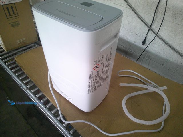 Lot 49-1516484 - white dehumidifier, tested works. IMPORTANT: Leave Item upright for 24 hours prior to powering on  R...
