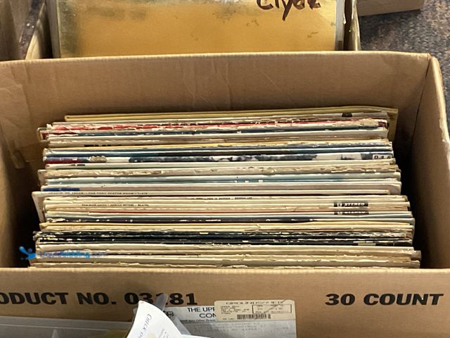 Lot 49-1830540 - COLLECTIBLE LARGE BOX FULL OF PRE-OWNED VINYL RECORDS VARIOUS GENRES AND TITLES INCLUDING AEROSMITH,...
