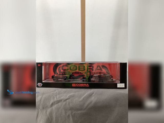 Lot 49-910667 - New Other M2 Machines Release 90 Auto Hauler Collectible Set - 1976 Ford Bronco and 1965 Shelby 427 ...