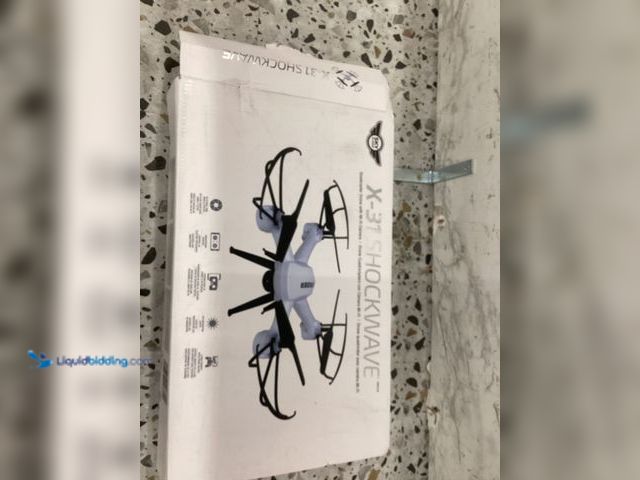 Lot 49-5446955 - SKY RIDER Pro Quadcopter Drone with Wi-Fi Camera, Remote and Phone Holder, White Unused, unable to t...