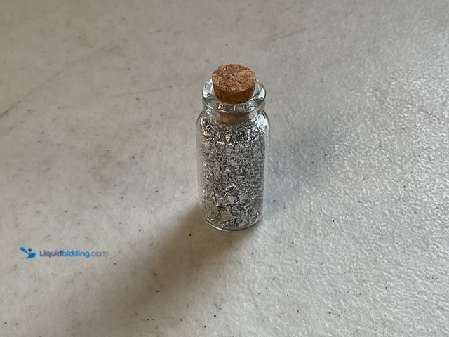 Lot 49-1505421 - RARE ONE INCH GLASS VILE OF PURE SILVER FLAKES #COINS0122