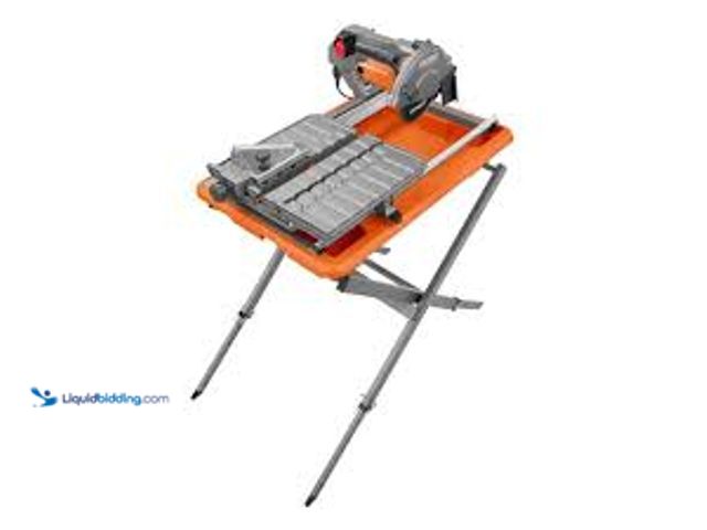 Lot 49-5415211 - RIDGID 9-Amp 7 in. Blade Corded Wet Tile Saw with Stand. Model # R4031S. Used.