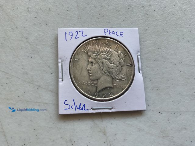 Lot 49-1804646 - 1922 PEACE ONE DOLLAR COIN.
