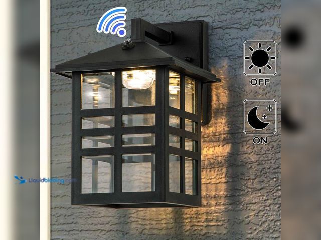 Lot 49-5484910 - 1-Light Black Dusk to Dawn LED Outdoor Wall Lantern Sconce with Clear Glass Shade Unused