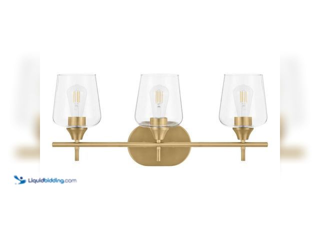Lot 49-5406406 - Hampton bay Pavlen 24 in. 3-Lights Antique Brass Vanity Light with Clear Glass Shades, Model # GS-W0...