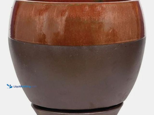 Lot 49-5452607 - Kendall 11.81 x 7.09 in. 4 qt. Copper Ceramic Indoor Egg Indoor/Outdoor Planter. Item is unused.