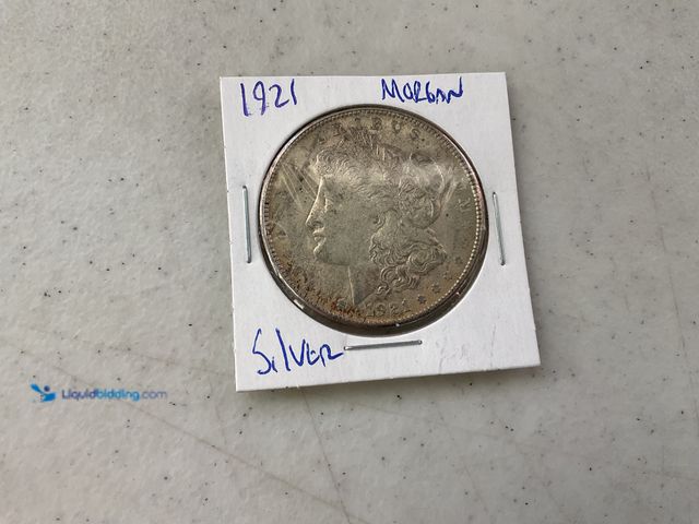 Lot 49-1811270 - 1921 MORGAN SILVER DOLLAR COIN 90% SILVER