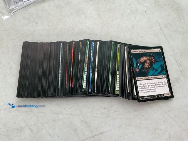 Lot 49-1505807 - COLLECTIBLE 100+ MAGIC THE GATHERING TRADING CARDS VARIOUS YEARS AND TYPES