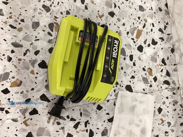 Lot 49-5414525 - RYOBI
40V Lithium-Ion Rapid Charger Model # OP406A unused tested works