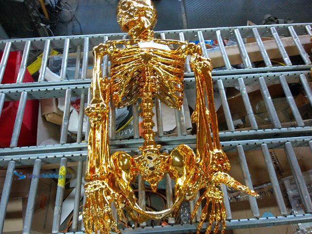 Lot 49-1534699 - Life Size Gold Plated Posable Skeleton Halloween Décor, Model #866593, Unused.  Ref#HW1009