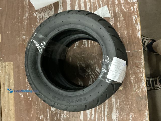 Lot 49-3563556 - QTY 2 - 90/65-6.5 Tires (no rim), not for highway use. Used, slightly, no hardware/acessories.
