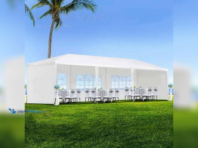 Lot 49-3616988 - 10 ft. x 30 ft. White Party Wedding Tent Canopy - slightly used Model # W1205137302YF