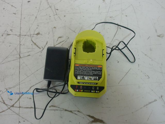 Lot 49-3617088 - RYOBI ONE+ 18V Lithium-Ion Charger Model # PCG002 - slightly used , includes charger only , scuffs a...