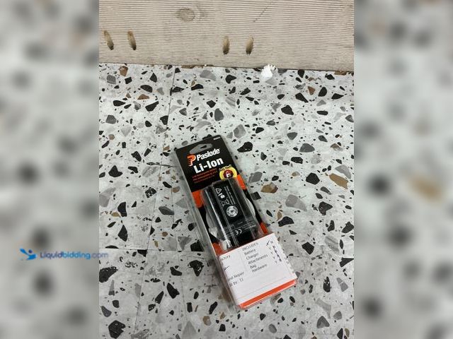 Lot 49-5476858 - Paslode Lithium-Ion Rechargeable Battery. Model # 902654. Unused.