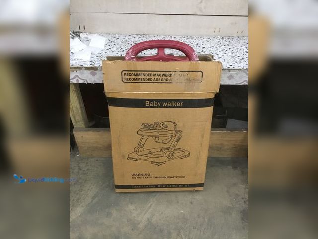 Lot 49-3513492 - Red Baby Walker. [Model: 009] Used