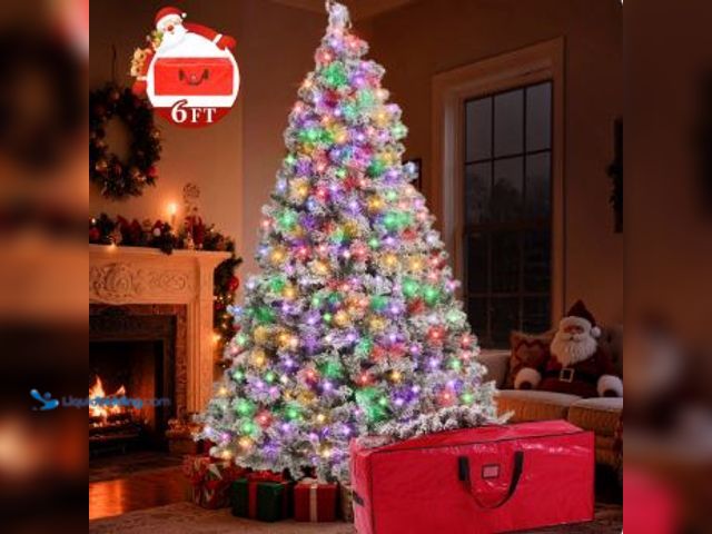 Lot 49-1544249 - Yexmas 6FT Snow Flocked Christmas Tree, Slightly used, No storage bag.  Ref#HOL1116