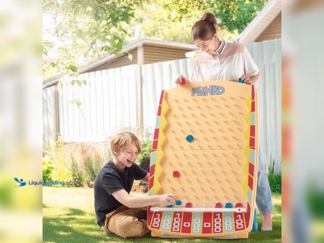 Lot 49-2026328 - Plinko Game. Model # 840281713424. MSRP: $84.89. Slightly used, has attachments, shipping damage. No...
