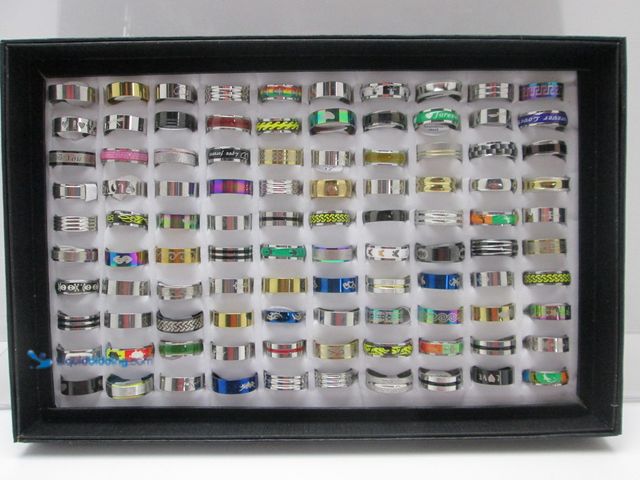 Lot 49-1616187 - Bulk Lot of 100 Stainless Steel Rings in Retail Display Box - NEW - Includes Men's and Women's Sizes...