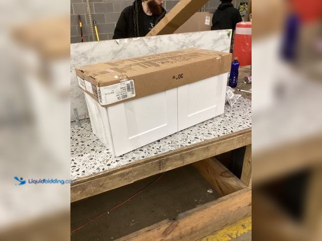 Lot 49-3531414 - Hampton Bay 30in. W X 15in. H X 12in. D Shaker Assembled Wall Cabinet, Satin White Item is unused.