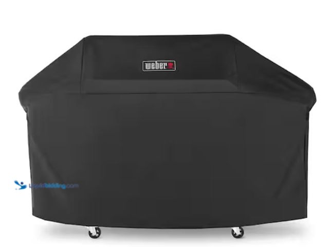 Lot 49-3614535 - Weber Genesis 4-Burner Premium Grill Cover, Model # 7758, Slightly used.  Ref#HD0716