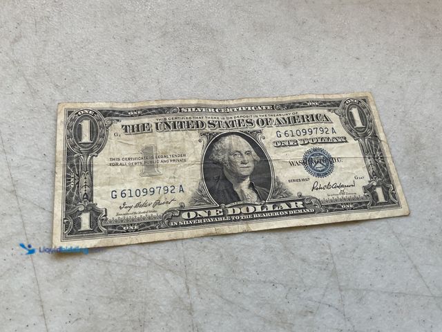 Lot 49-3609219 - 1957 BLUE SEAL UNITED ONE DOLLAR SILVER CERTIFICATE