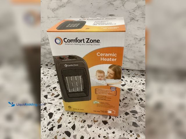 Lot 49-3528036 - Comfort Zone Ceramic Electric Portable Fan-Forced Heater. Item is unused.