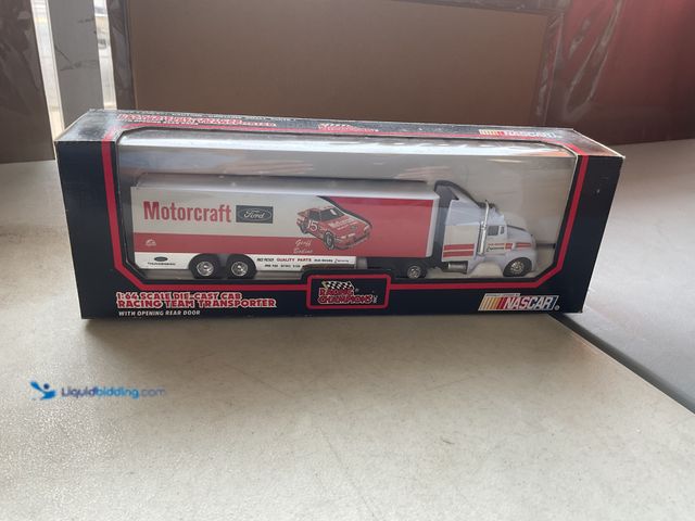 Lot 49-1977486 - Other RACING CHAMPIONS NASCAR 1/64 SCALE DIECAST CAB RACING TEAM TRANSPORTER MOTORCRAFT FORD GEOFF B...