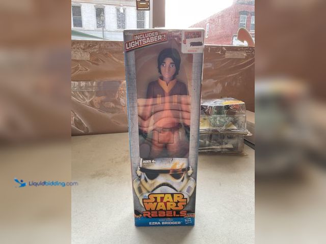 Lot 49-3503738 - Other 2014 STAR WARS REBELS HERO SERIES “EZRA BRIDGER” 11 INCH ACTION FIGURE IN ORIGINAL BOX
