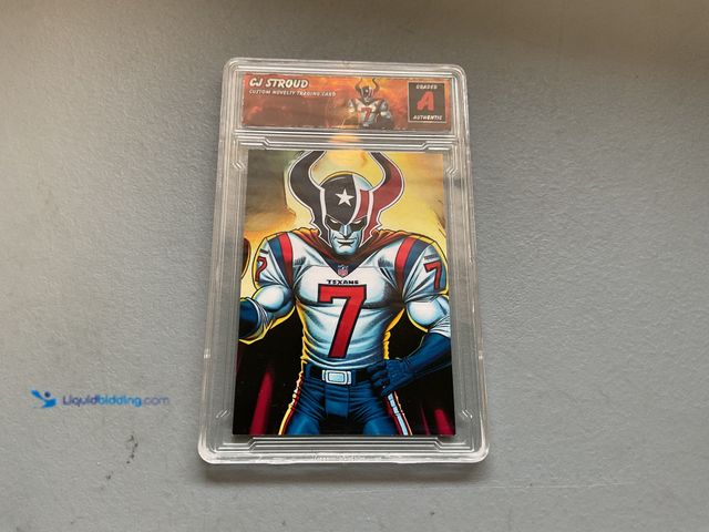 Lot 49-1804302 - ENCAPSULATED CJ STROUD CUSTOM ART NOVELTY TRADING CARD .