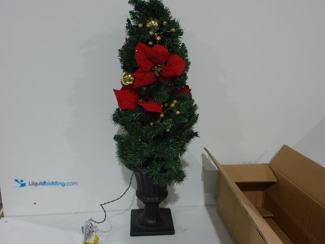 Lot 49-2000925 - 3 ft. Pre-lit Christmas Tree with Ornaments in Black Pot, Decorated with Ornaments, Poinsettias and ...