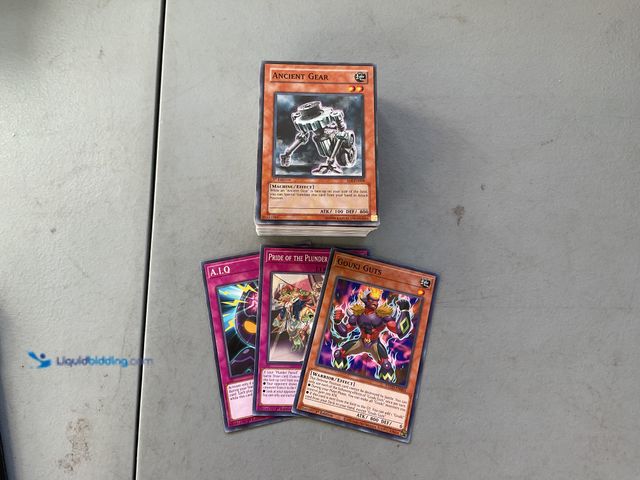 Lot 49-1811399 - COLLECTIBLE 100+ YU-GI-OH TRADING CARDS FROM VARIOUS YEARS AND TYPES