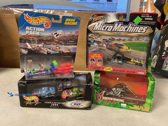Lot 49-1830502 - COLLECTIBLE LOT OF 4 DIECAST TOYS IN ORIGINAL BOXES INCLUDING HOT WHEELS, MICRO MACHINES AND MARTIN ...