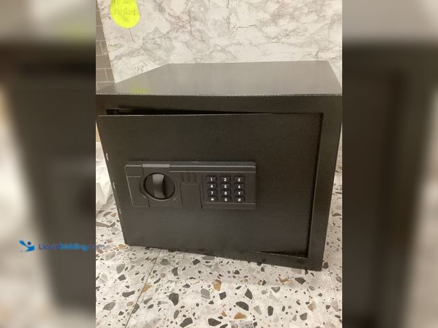 Lot 49-5452164 - Jet Black Fireproof Safe With Keypad. Item is used.