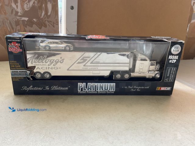 Lot 49-5515562 - Other RACING CHAMPIONS PLATINUM PLATED PRECIOUS METALS SERIES 1/64 SCALE DIECAST TRANSPORTER WITH ST...