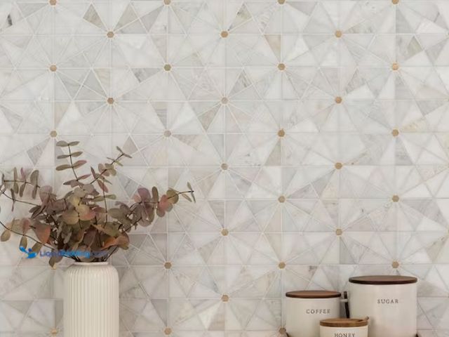 Lot 49-3433444 - Approx. (8.5) sq. ft. of MSI Elegante White Pinwheel 11 in. x 12 in. Stone/Metal Mesh Mounted Mosaic...