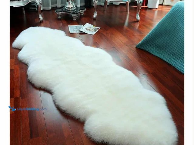 Lot 49-1990887 - Genuine Sheepskin Rug. LLB Genuine sheepskin area rug. Fur rug carpet, 2X6 FT.